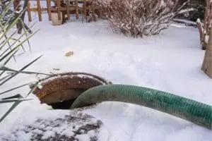 Sewage pipe during snow