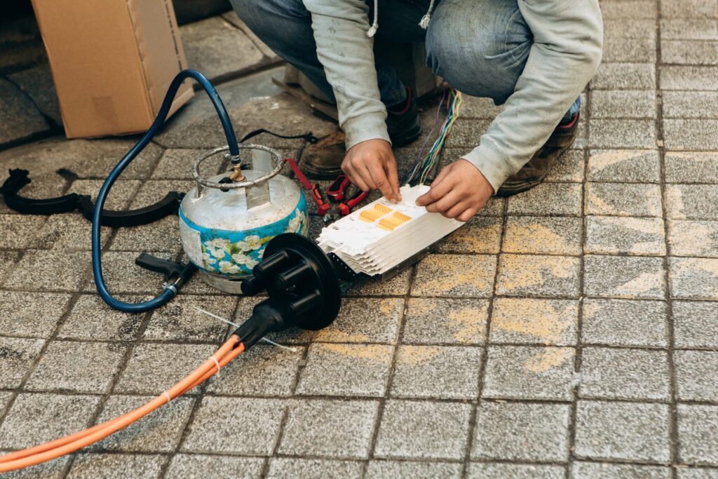 water damage restoration specialist cleaning up water damage on floor